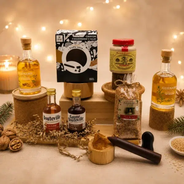 Coffret de condiments premium composé d'huiles vierges, vinaigres gastronomiques, moutarde de Meaux, fleur de sel et assaisonnement à la truffe noire présenté dans une ambiance festive.