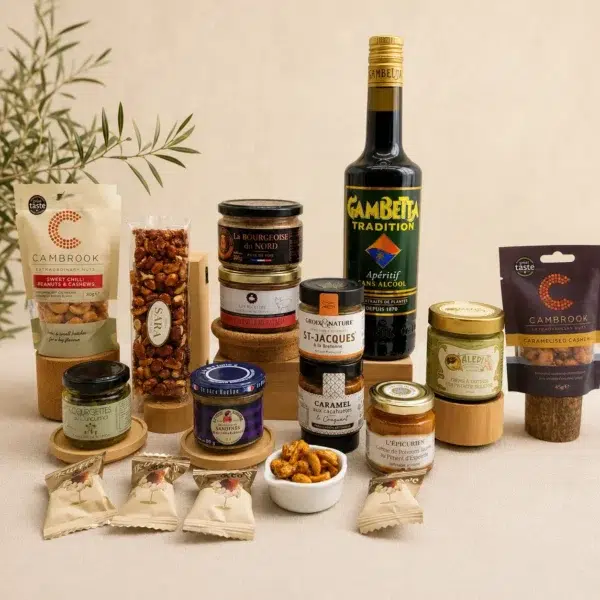Coffret Gourmand Sélection Authentique avec Gambetta sans alcool, Saint-Jacques bretonnes, crème de pistache, tartinables artisanaux, fruits secs et spécialités apéritives.