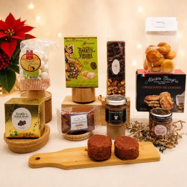Cadeau Gourmand – Saveurs d’Autrefois avec amaretti, nougat noir, financiers, croquants aux amandes, meringues poire-chocolat, pain d’épices aux figues et douceurs de Noël. Description photo malvoyants