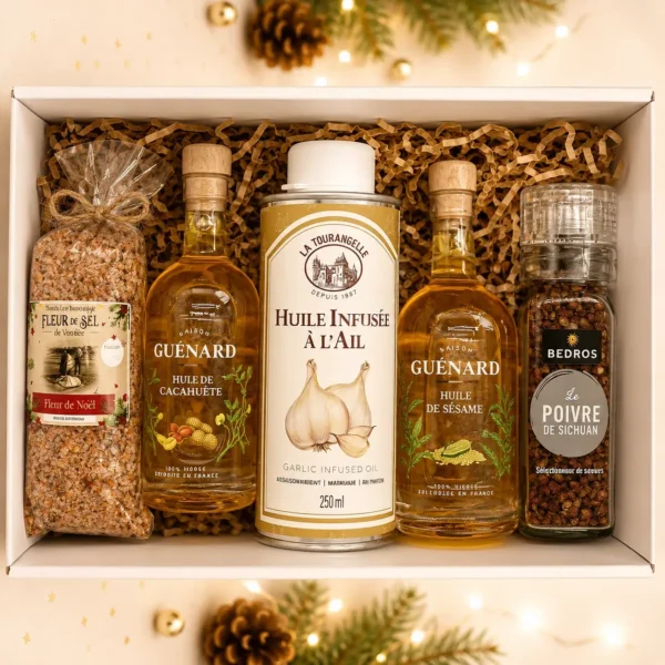 Coffret culinaire d’épicerie fine avec huiles de cacahuète, sésame et ail, fleur de sel de Vendée et poivre de Sichuan dans une box cadeau festive.